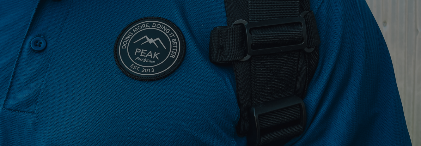 peak pest pro logo on shirt